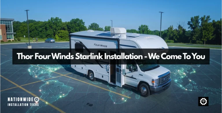 Thor Four Winds Starlink installation on a white Class C coach built on a Ford E-Series cutaway, seen from above the cab-over bunk, the flat Starlink panel lying on the roof beside the air conditioner shroud and the factory solar panel, patio awning out and entry door open on a paved lot